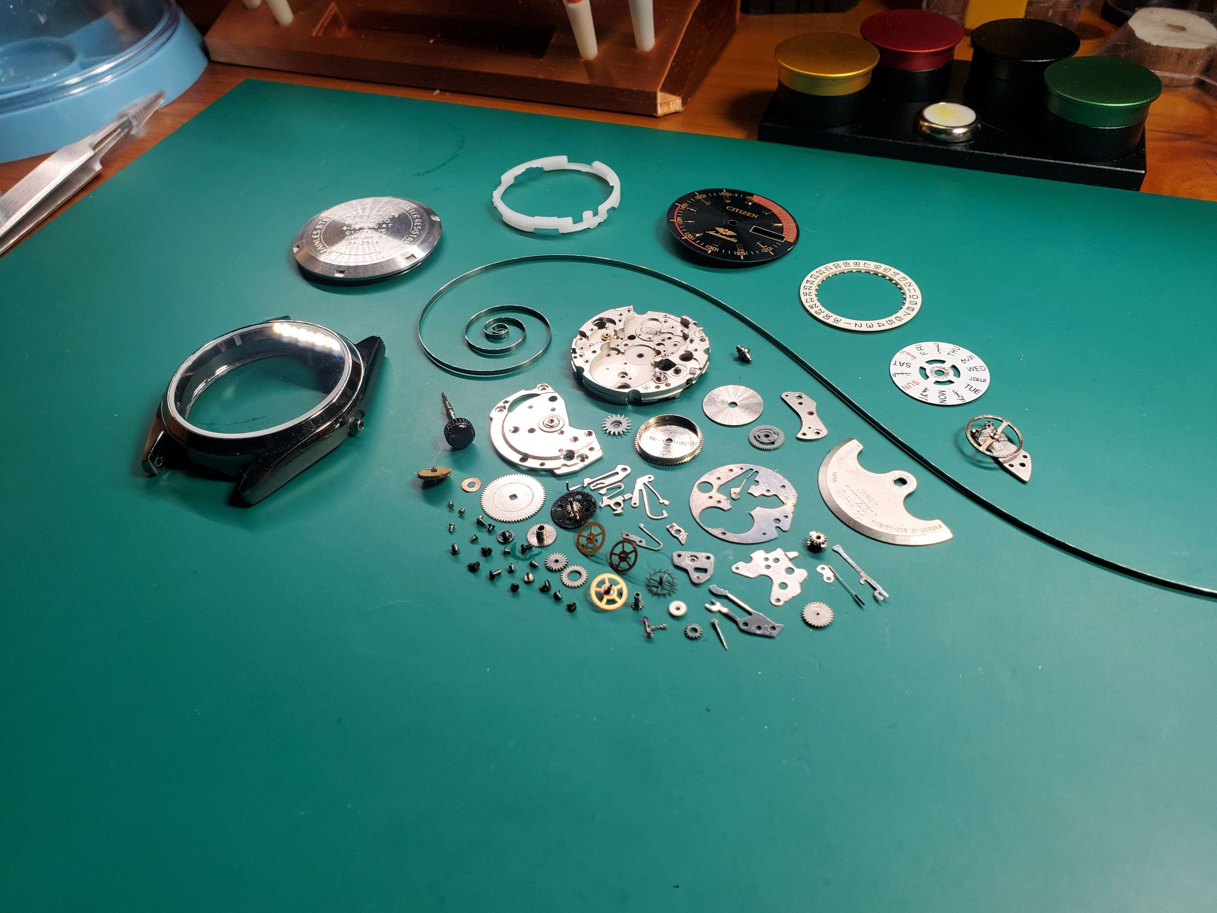 [Image of a disassembled watch]